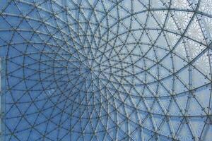 Glass metal structure spiral and shapes. Construction and building design photo