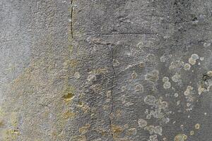 Rough old concrete wall texture with scratches photo