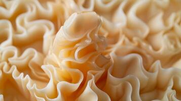 A zoomedin view of a waxy taper candle with its delicate and intertwined layers creating a complex texture photo