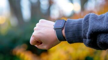 A wearable fall detection device attached to a persons wrist providing peace of mind and immediate assistance in case of an accident photo