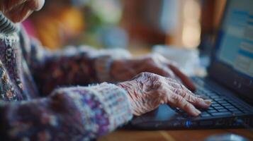 An elderly person using a computer with screen enlargement software to read an article photo
