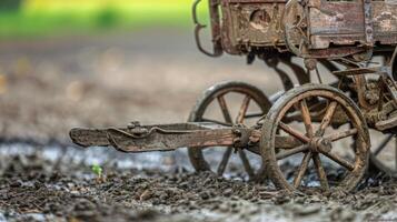 The iconic image of a horsedrawn plow is captured in a detailed replica evoking memories of a simpler and more primitive way of earthmoving photo