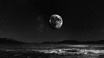 The moons grand and bright form seems to command the night sky drawing all attention to itself photo