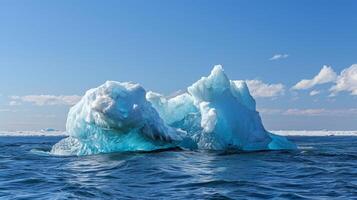 As the iceberg continues to break apart its unique formations create an otherworldly landscape photo