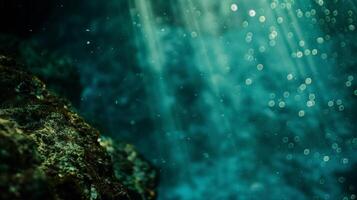 A mysterious underwater shot highlighting the undulating halocline in a cenotes depths photo