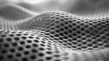 A maze of small raised dots tightly packed together creating a bumpy and textured surface that aids in grip and friction for a variety of uses photo