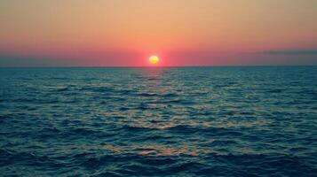 A slowmoving sunset over a calm ocean symbolizing the gradual decline of cognitive abilities in older age photo