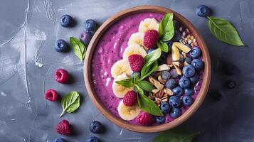 A colorful smoothie bowl with blueberries bananas and leafy greens highlighting the importance of incorporating antioxidants and nutrients into meals for optimal brain health photo