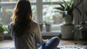 A person practicing and tracking their mindfulness techniques as part of their personalized mental health plan photo