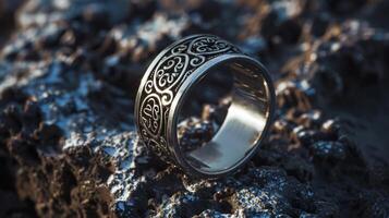 A silver ring with intricate patterns inspired by ancient memory techniques used by Greek philosophers photo