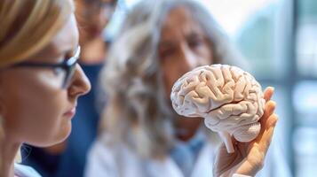 Caregivers learning about the importance of proper nutrition and hydration for maintaining brain health photo