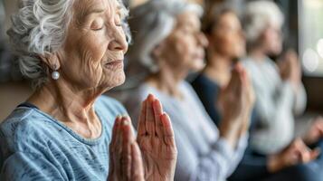 A group of seniors practicing gentle yoga poses in a group therapy session promoting stress relief and improved cognitive function photo