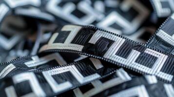 A black and white ribbon with a symbol of a maze representing the struggles and challenges of living with a brain disease photo