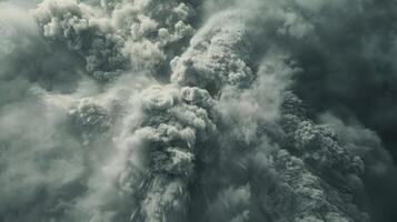 Thick and heavy clouds of ash being swept up in a deadly vortex photo