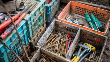 Crates of supplies and tools tered around the site ready to be used for the days work photo