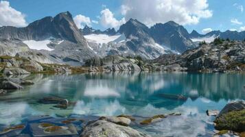Surrounded by towering peaks these supraglacial lakes provide a pop of color in an otherwise monochromatic landscape photo