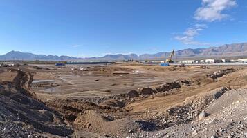 A panoramic view of the construction site showcasing the progress made in reclaiming the land and preparing for new development photo
