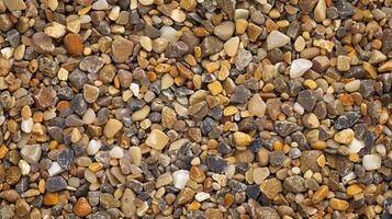 Tiny pebbles stacked together creating a smooth and uniform surface photo