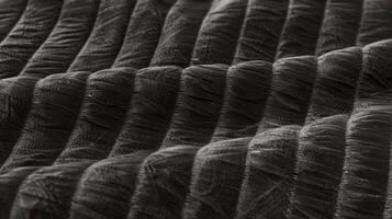 Soft charcoal grey velvet with faint diagonal lines that add subtle texture to the fabric photo