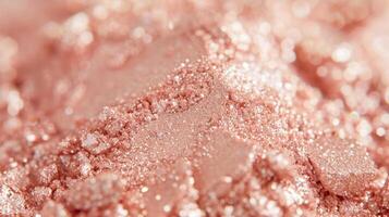 A detailed shot of a champagne colored loose pigment perfect for adding a touch of glitter and sparkle to any eyeshadow or highlighter look photo