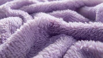 The gentle rippled texture of lavender fleece creating a soothing and delicate touch like a soft hug photo