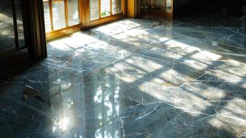 The cool touch of polished marble contrasted with the warmth of sunlight pouring through a nearby window photo