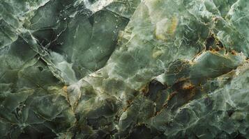 A textured view of a large smooth jade stone casting a subtle sheen in shades of deep forest green and earthy moss photo