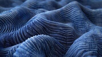 Bold ridges and valleys create a dynamic almost mountainlike formation on the denim giving it a rugged and outdoorsy feel photo