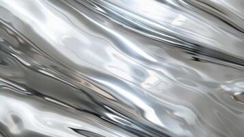 A soft and silky smooth texture with a faint hint of coolness creating a luxurious and modern feel to the polished aluminum surface photo