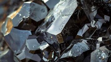 A closeup of obsidian with a smooth mirrorlike surface that reflects the surrounding environment giving it a beautiful otherworldly quality photo