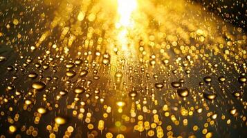 A of glistening water droplets on a metal surface each one reflecting the bright sun above in a different direction photo