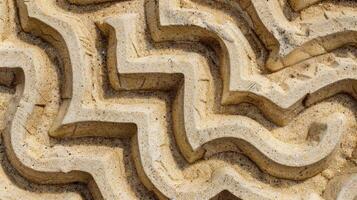The overlapping patterns of sand converge and diverge resembling a maze or puzzle waiting to be solved photo