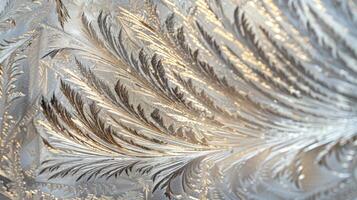 Frozen Feathers Thin lines of frost layered on top of each other create a featherlike texture on the glass adding a touch of whimsy to the frost patterns photo