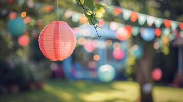 Softly blurred scene of a garden party with playful paper lanterns and buntin photo