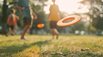 Defocused players passing a frisbee back and forth in a casual outdoor game photo