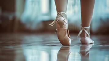 Blurred glimpses of delicate ballet slippers gliding across the floor photo