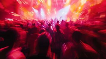 Lost in the rhythm and the blur of lights the crowd becomes a wild unified entity photo