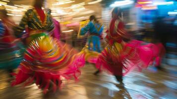 Blurry figures swaying along to the rhythm of the traditional dancing at the event photo