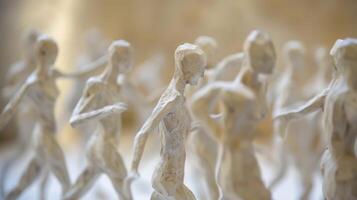 Hints of human movement blend with the static presence of the sculptures creating a dynamic and engaging scene photo