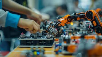 Blurry hands deftly work the controls guiding the robots through the obstacles photo