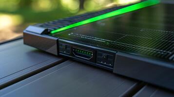 A closeup of the charging ports showing the small green light indicating that the solar panels are successfully charging devices photo