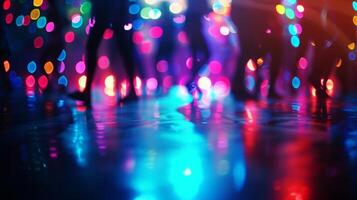 Blurred bursts of colorful spotlights shining down on a dimly lit dance floor the silhouetted figures of people moving to the rhythm ly visible in the background. photo