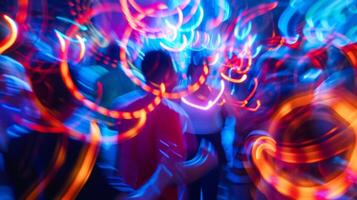 Defocused swirls of neon lights enveloping a crowded dance floor the pulsating beats of the music adding to the chaotic energy of the scene. photo