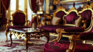 Defocused view of a luxurious room with a velvety deep purple background complementing the ornate gold and red furnishings. photo