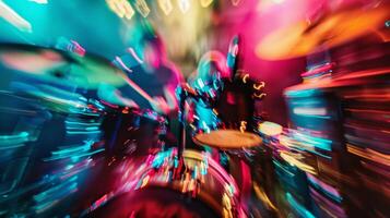 The chaotic blur of vibrant concertgoers enveloped in a sea of sound and energy swaying to the beat of the drums in a defocused background. photo