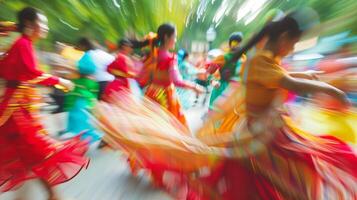 Defocused image 2 Against a blurred background vibrant hues of red green and yellow stand out as students dance and twirl in traditional dresses celebrating the campus multicultural photo