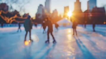 Defocused cityscape in the distance with the rising sun casting a warm glow on the skaters gliding on the still tranquil ice rink. photo