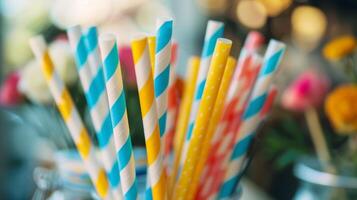 A display of paper straws an alternative to singleuse plastic straws that are harmful to the environment photo