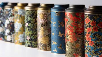 Organic tea tins lined up in a row each with its own distinctive pattern and flavor photo