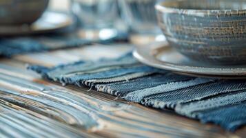 A set of placemats woven from strips of old jeans adding a touch of ecofriendly style to any table setting photo
